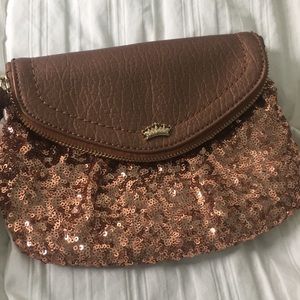 FINAL PRICE. NWOT Juicy Couture rose gold wristlet